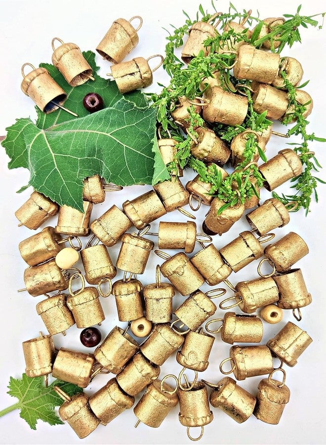 HIGHBIX 50 Mini Golden Rustic Cow Bells - 0.75 Inch Handcrafted Tin Metal Bells for DIY Crafts, Wind Chimes, Garland, Wedding Décor, Christmas Ornaments & Festival Decorations - Image 1